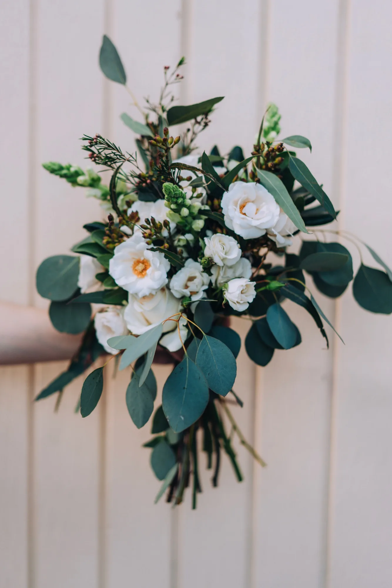 Bride holding bouquet of flowers
